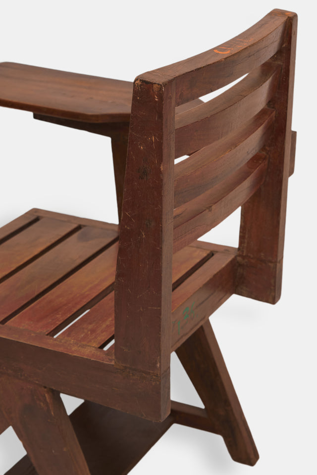 A teak paddle armchair designed for the Chandigarh University, circa 1950s