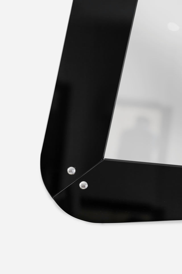 Black opaline framed mirror, circa 1960