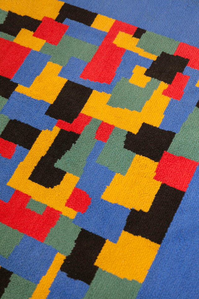 Blue and green geometric rug, circa 1960