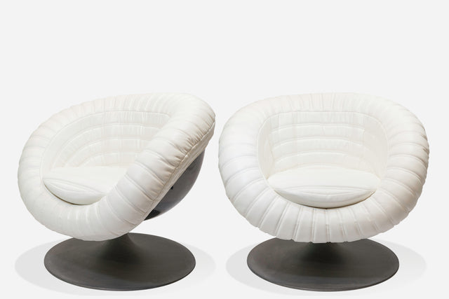 Pair of 'baseball glove' armchairs, circa 1970