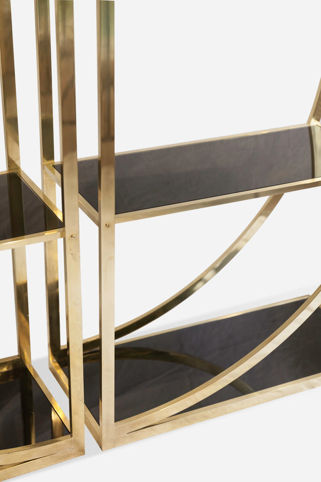 Pair of halfmoon bookcases, circa 1970s