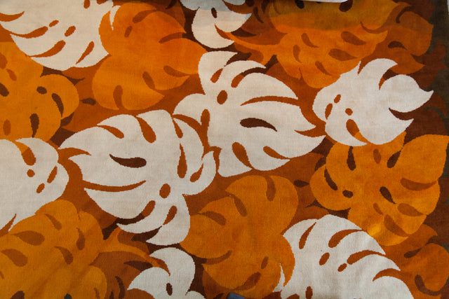 White and orange leaves rug, circa 1970