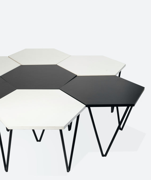 Set of seven hexagonal coffee tables, circa 1955