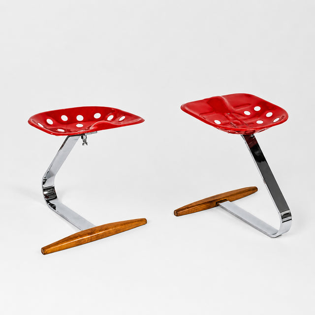 Pier Giacomo & Achille Castiglioni, Pair of ‘Mezzadro’ stools, 1970s.
